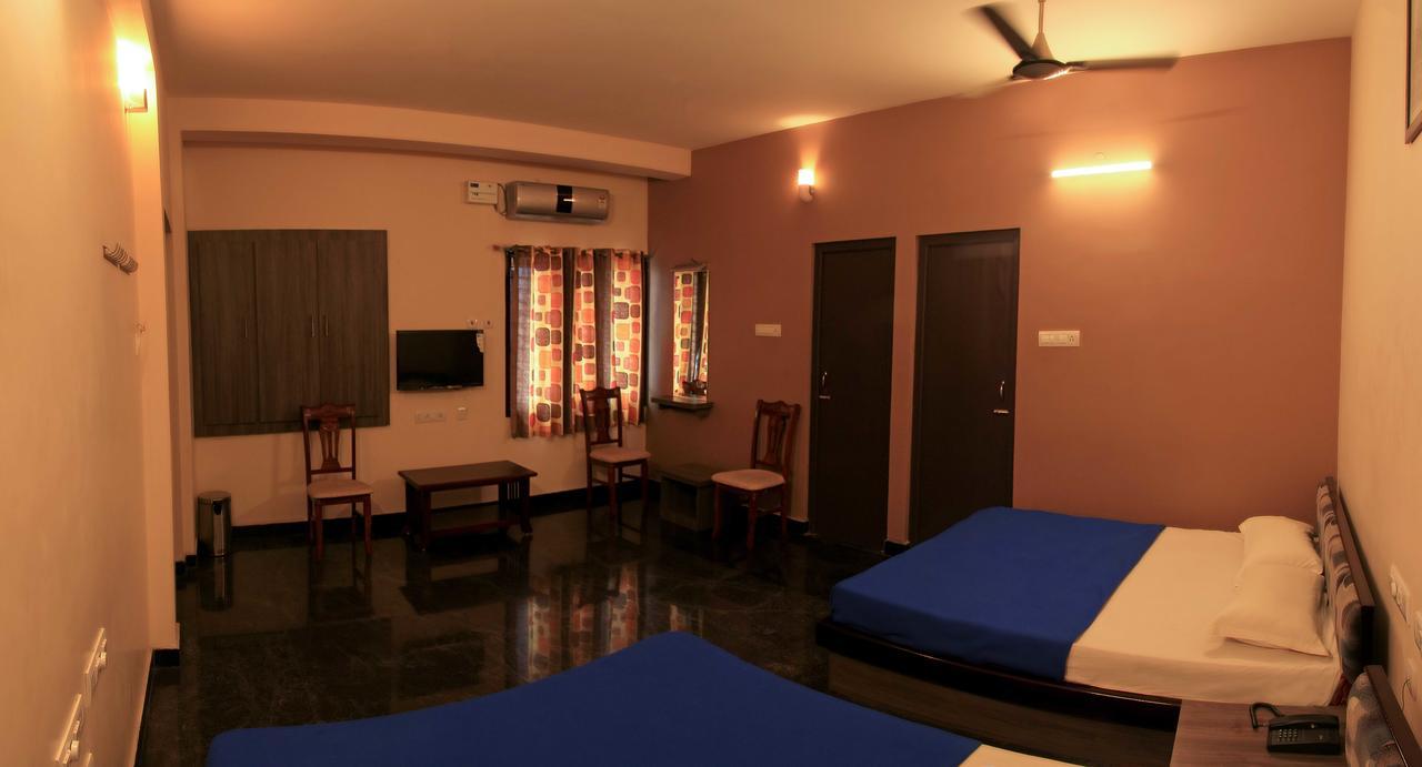 Hotel Sri Hayagriva Tiruchirappalli Номер фото